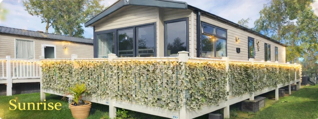 Sunrise caravan with spacious wraparound decking